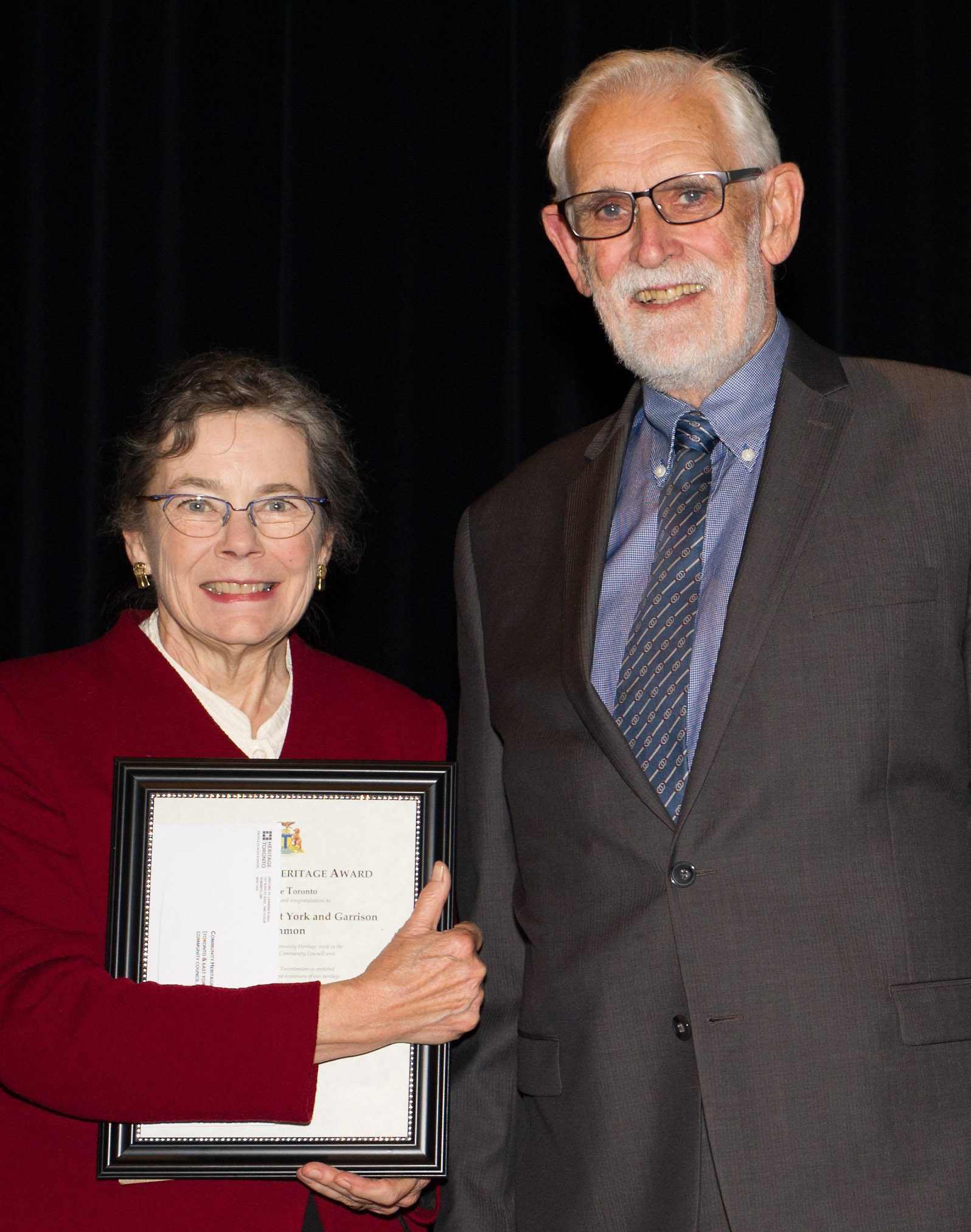 Patricia Fleming, editor of The Fife and Drum, and Joe Gill, past chair of the Friends of Fort York who founded the newsletter in 1998, took to the stage to receive our Community Heritage Award. Credit: Heritage Toronto